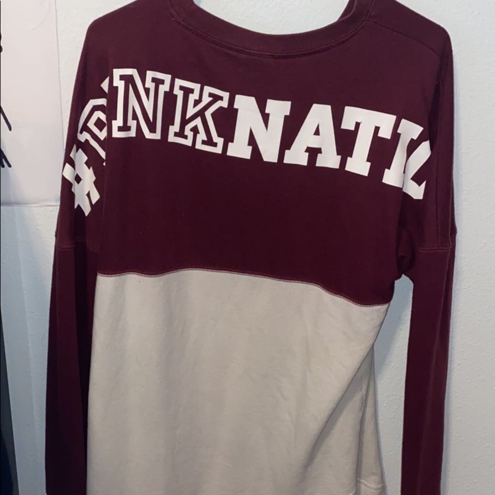 medium pink sweater half maroon half white